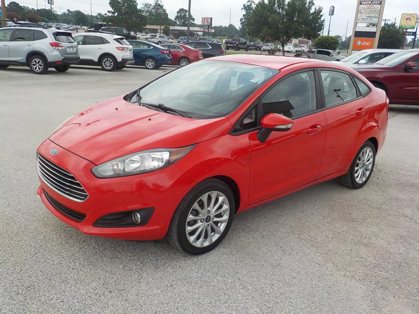 2014 Red /Charcoal Ford Fiesta (3FADP4BJ0EM) , Automatic transmission, located at 1617 W Church Street, Livingston, TX, 77351, (936) 327-3600, 30.710995, -94.951157 - WOW!! Need to check this one out for the price range it's in! You won't be disappointed! - Photo#3